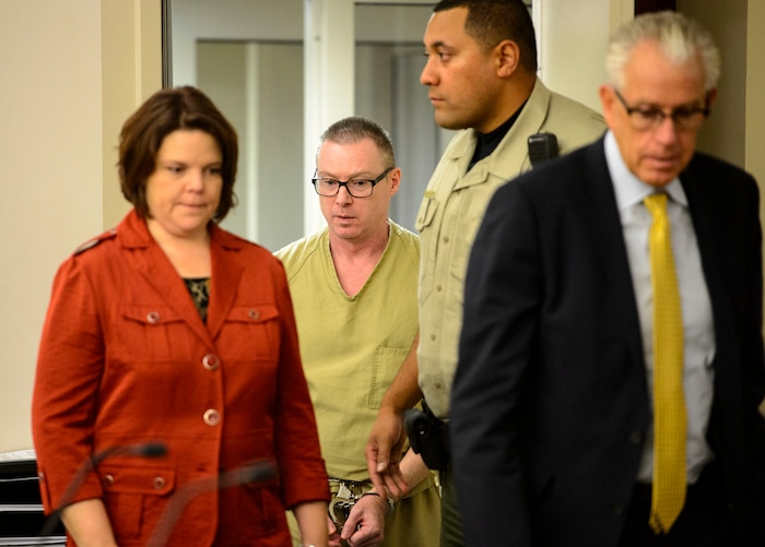 (Steve Griffin  |  The Salt Lake Tribune)  Craig Crawford, center, enters Third District Judge James Blanch's courtroom for his sentencing after admitting that he trapped his 72-year-old estranged husband, well-known restaurateur John Williams, inside his home and then set it ablaze last year. Judge Blanch sentenced Crawford to life in prison without the possibility of parole at the Matheson Courthouse in Salt Lake City Thursday August 31, 2017.