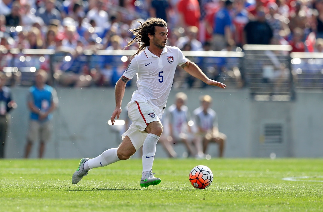 This July 18, 2015 photo shows United States' Kyle Beckerman playing during the first half of a CONCACAF Gold Cup soccer quarterfinal match against Cuba in Baltimore. Beckerman will miss the United States' World Cup qualifiers against Mexico and Costa Rica because of injuries. (AP Photo/Patrick Semansky)
