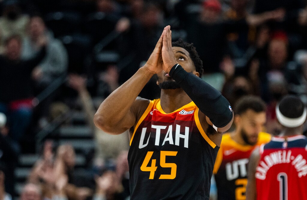 (Rick Egan | The Salt Lake Tribune) Utah Jazz guard Donovan Mitchell (45) celebrates after putting the Jazz up by 2 points with 2:50 remaining the the game, in NBA action between the Utah Jazz and the Washington Wizards, at Vivint Arena on Saturday, Dec. 18, 2021.