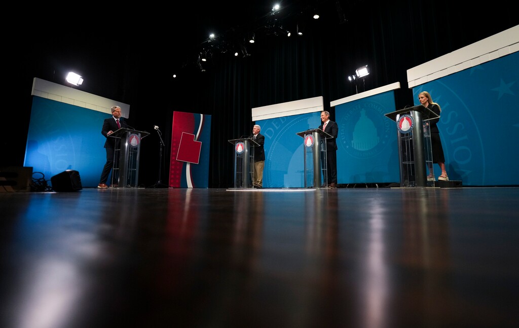 (Bethany Baker | The Salt Lake Tribune) From left, Independent American candidate Carlton Bowen, U.S. Rep. John Curtis, and Democratic candidate Caroline Gleich participate in the U.S. Senate debate arranged by the Utah Debate Commission at Weber State University in Ogden on Thursday, Oct. 10, 2024.