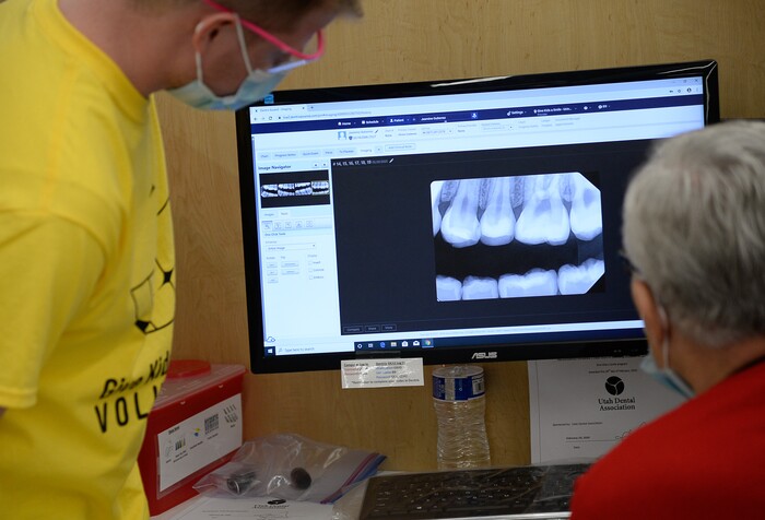 (Francisco Kjolseth  |  The Salt Lake Tribune) Kids fill and rotate through 60 chairs at the University of Utah dental school, as part of the American Dental AssociationÕs ÒGive Kids a SmileÓ program on Saturday, Feb. 29, 2020. Launched in 2003, the program gives no-cost care to thousands of kids nationwide.