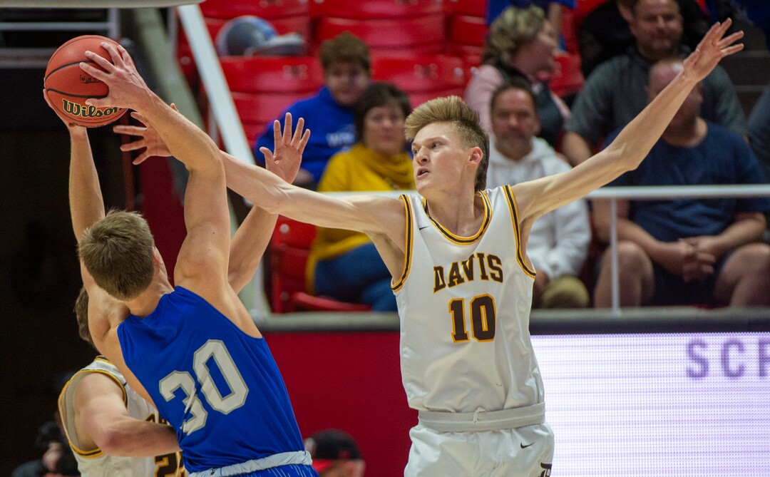 (Rick Egan  |  The Salt Lake Tribune)   Fremont Silverwolve's Baylor Harrop (10)shoots over Davis High guard Trevan Leonhardt (10), in the 6A basketball championship game at the Jon M. Huntsman Center, Saturday Feb. 29, 2020