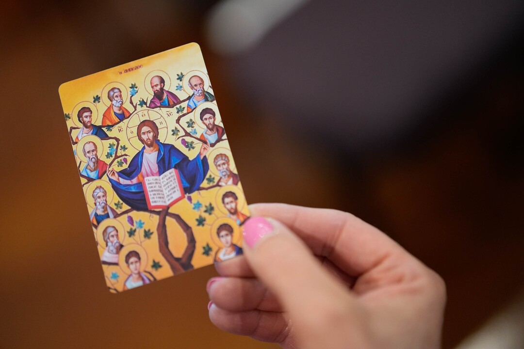 (Francisco Kjolseth  |  The Salt Lake Tribune) Icons are passed out by Archbishop Elpidophoros of America following opening ceremonies at St. Anna Greek Orthodox Church in Sandy on Saturday, July 13, 2024.