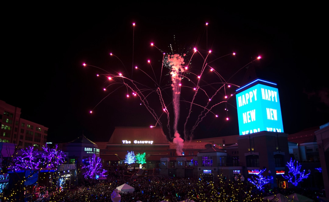 (Rick Egan  |  The Salt Lake Tribune)   Fireworks explode at midnight at the Last Harrah New Years Eve party at the Gateway, Sunday, December 31, 2017.