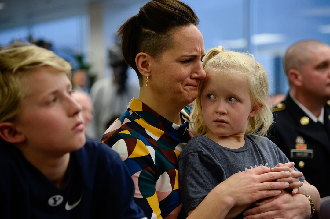(Francisco Kjolseth  |  The Salt Lake Tribune)  Kate Taylor Borden, sister of Jennie Taylor, embraces her niece Eleanor Taylor, 6, as she attends a service for her former brother-in-law, Brent Taylor who was killed in Afghanistan in 2018. Brigham Young University honored the life and legacy of Major Brent Taylor, former mayor of North Ogden and a BYU Army ROTC alumnus during a ceremony at the Ernest L. Wilkinson Student Center in Provo on Thursday, May 23, 2019. The BYU Army ROTC also unveiled the updated Memorial Wall, a list of BYU students and alumni who have died in service which will now include Major TaylorÕs name.