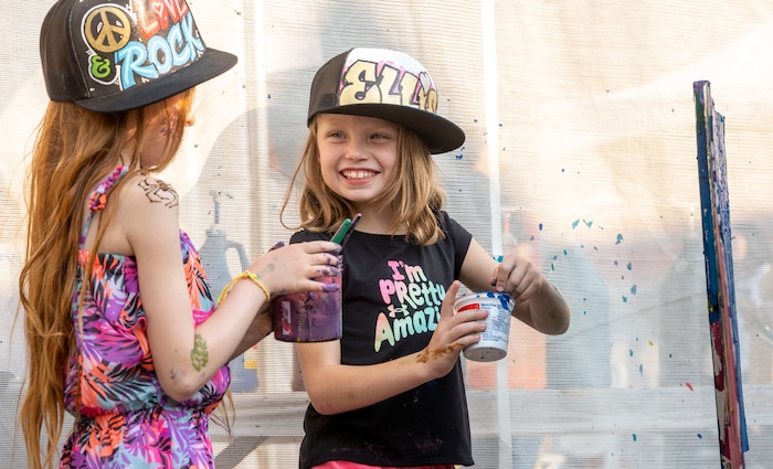 (Rick Egan | The Salt Lake Tribune)  Eloise Hall and Olivia Aledlde have fun painting at the creative corner at the Salt Lake Arts Festival, on Saturday, Aug. 28, 2021.