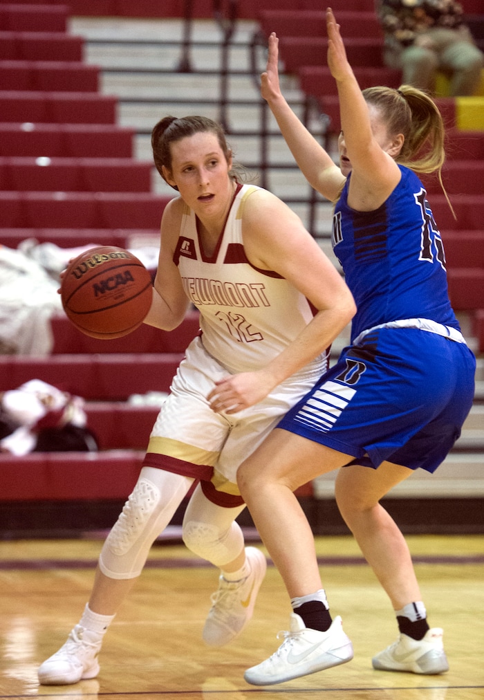 (Rick Egan  |  The Salt Lake Tribune)    Mercedes Staples (12) Viewmont, makes a move to the basket, as Maggie McCord (15) defends for Bingham, in prep basketball action, Bingham vs. Viewmont, in Bountiful, Wednesday, January 3, 2018.