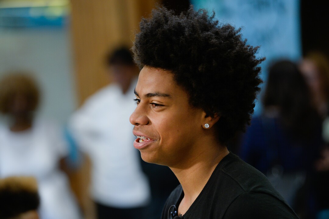 (Francisco Kjolseth  |  The Salt Lake Tribune)  Kearns High sophomore Keeven Wilson, 16, speaks with the media after being announced as the Granite School District's Absolutely Incredible Kid award winner during the school farewell assembly on Tuesday, May 22, 2018. Wilson who had a particularly difficult home life, to the point that he and his siblings were taken away from his parents and near universal F's during his junior high days turned his life around.  With the help of a new foster family, teachers and his football coach, he is now an honor roll student and thinking of studying psychology in college.