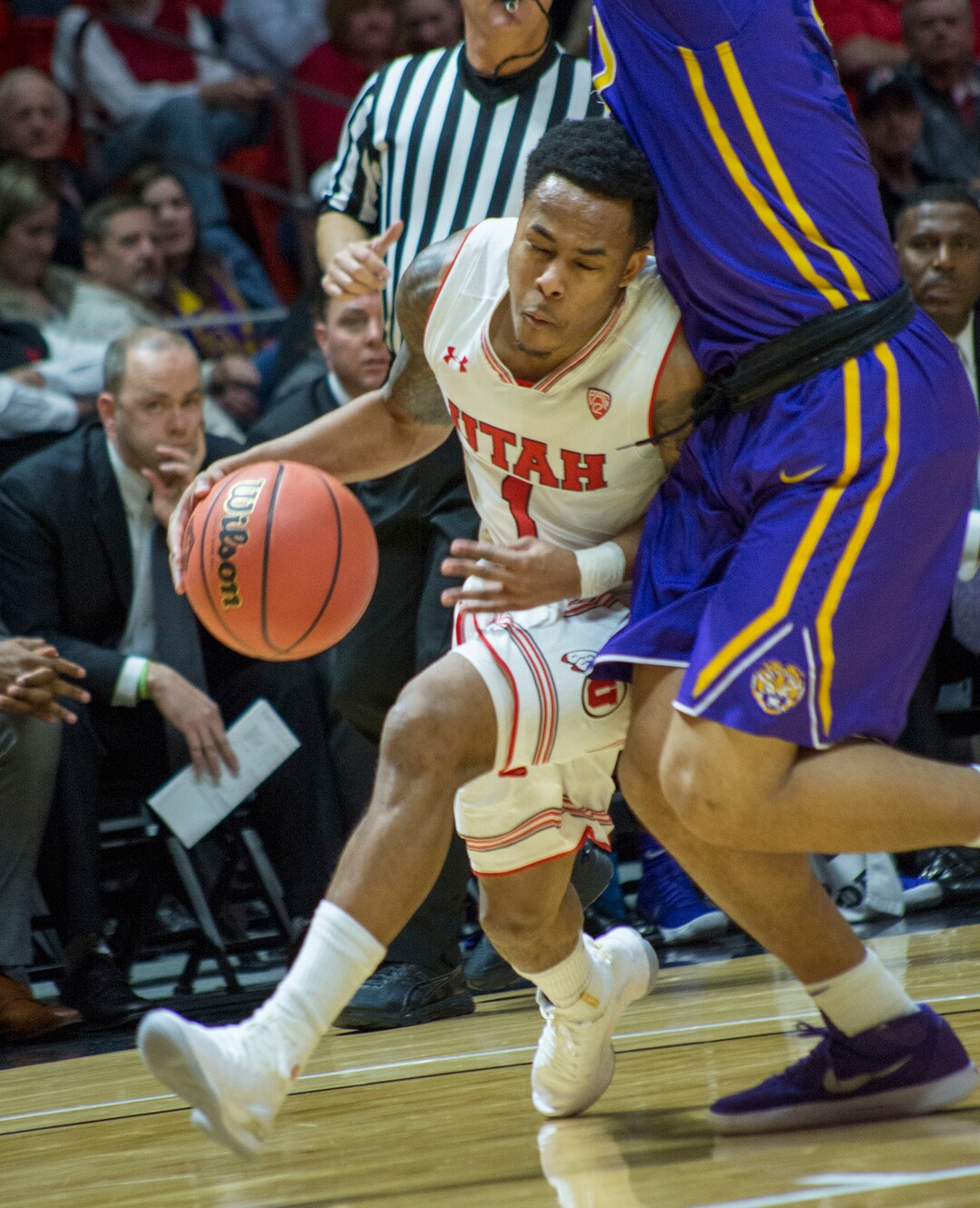 (Rick Egan  |  The Salt Lake Tribune)    LSU Utah Utes guard Justin Bibbins (1) tries to get past LSU Tigers guard Skylar Mays (4), in NIT playoff action between Utah Utes and LSU Tigers at the Jon M. Huntsman Center, Monday, March 19, 2018.