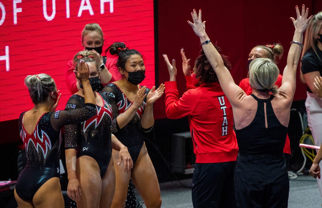 (Rick Egan | The Salt Lake Tribune)  Utah celebrates as Maile O'Keefe scores a 10 on the Beam, in PAC-12 gymnastics action between The University of Washington and The University of Utah at Jon M. Huntsman Center in Salt Lake City, on Saturday, Jan. 30, 2021.