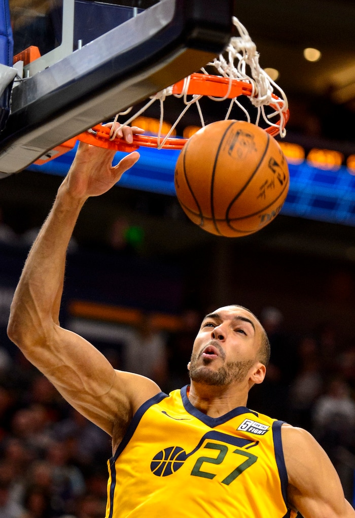 (Steve Griffin  |  The Salt Lake Tribune)  Utah Jazz center Rudy Gobert (27) throws down a dunk during the Utah Jazz versus Detroit Pistons at Vivint Smart Home Arena in Salt Lake City Tuesday March 13, 2018.