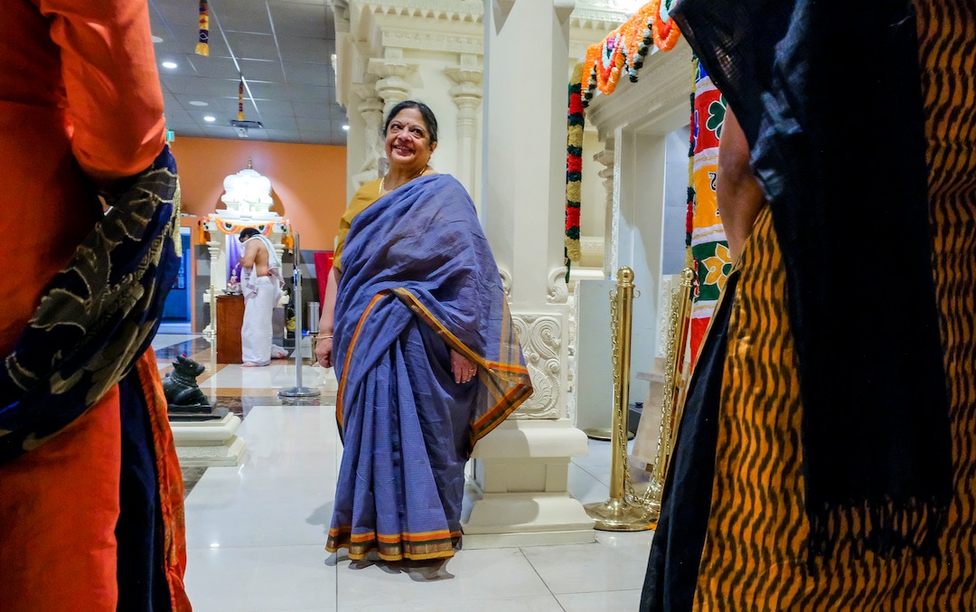 Leah Hogsten  |  The Salt Lake Tribune  Indra Neelameggham talks with fellow devotees of the Sri Ganesha Hindu Temple, March 28, 2019. Artisans from around the world spent two years hand-carving deities in the Sri Ganesha Hindu Temple in South Jordan. 