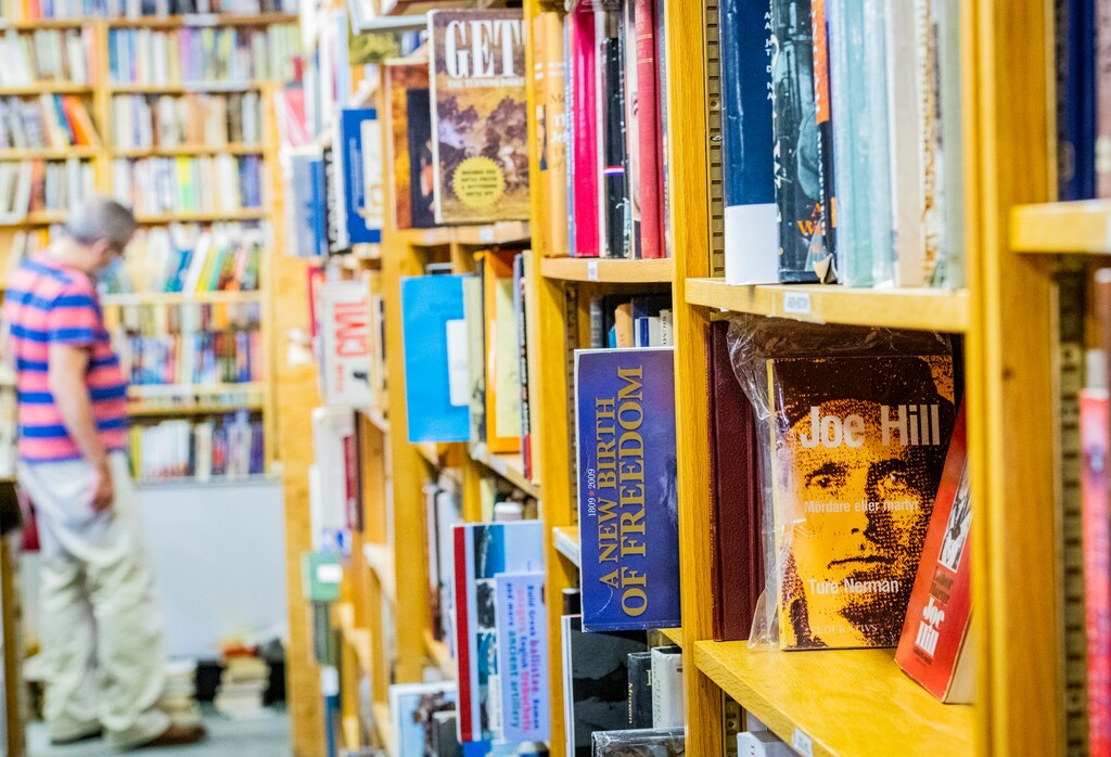 (Isaac Hale | Special to The Tribune) People browse books at Ken Sanders Rare Books in downtown Salt Lake City on Thursday, June 24, 2021.