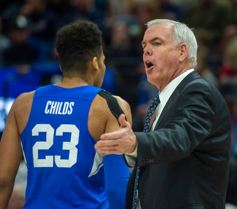 (Rick Egan  |  The Salt Lake Tribune)   against the Brigham Young Cougars head coach Dave Rose congratulates Brigham Young Cougars forward Yoeli Childs (23) as he scores the Cougars first 12 points of the game, in basketball action in the Beehive Classic, between against the Brigham Young Cougars and Utah Utes, a the Vivint Smart Home Arena, Saturday December 8, 2018.