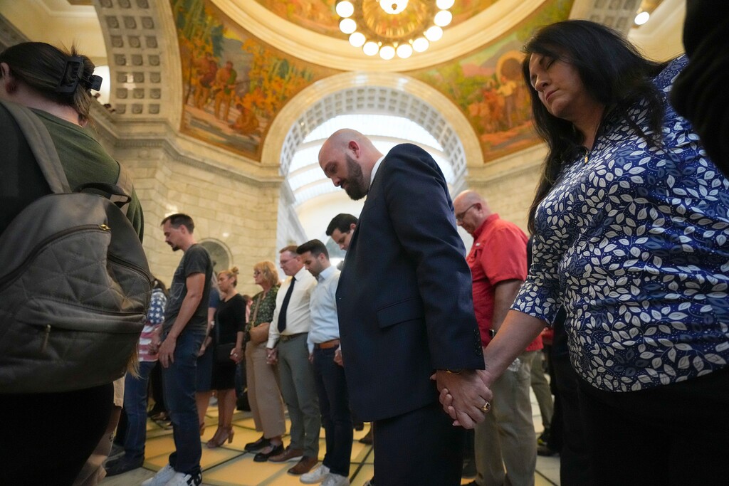 (Bethany Baker | The Salt Lake Tribune) People hold hands in prayer during a vigil at the Utah Capitol in Salt Lake City on Wednesday, Sept. 10, 2025, after the killing of conservative activist Charlie Kirk at Utah Valley University. Utah religious leaders are lamenting the violence.