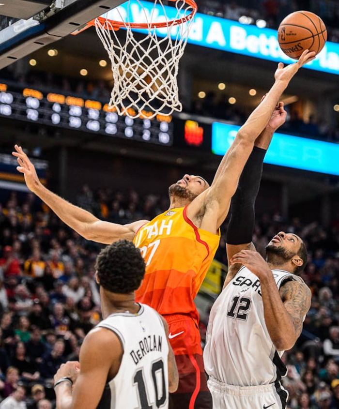(Trent Nelson | The Salt Lake Tribune)  
Utah Jazz center Rudy Gobert (27) and San Antonio Spurs center LaMarcus Aldridge (12) rebound as the Utah Jazz host the San Antonio Spurs, NBA basketball in Salt Lake City on Saturday Feb. 9, 2019.
