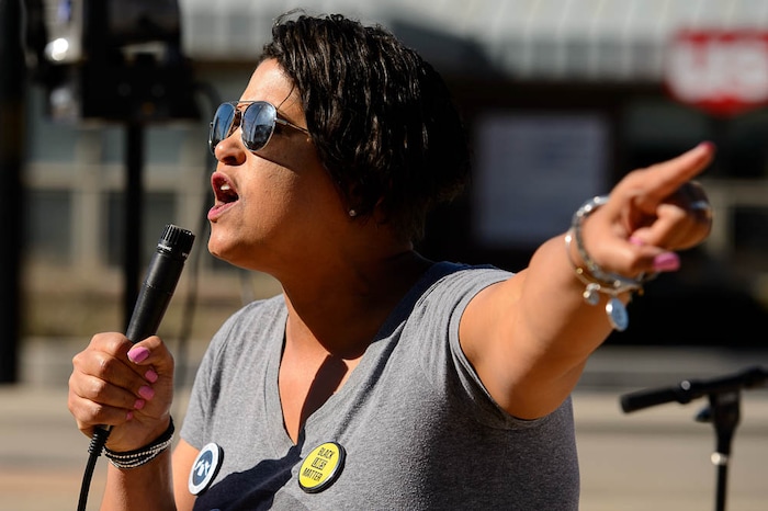 (Trent Nelson | The Salt Lake Tribune)
Utah Against Police Brutality holds a rally in front of West Valley City Hall, Saturday April 21, 2018. Elijah Smith was killed by West Valley Police on April 8 after he ran from them into a home. They shot him in the home's garage, while one hand was in the air and the other, activists say, appeared to be coming up, too. After body camera footage was released, the group began to call for the officer's firing. Lex Scott.