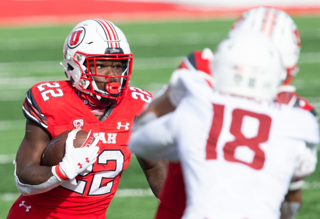 (Rick Egan | The Salt Lake Tribune) Utah  running back Ty Jordan (22) runs the ball for the Utes, in PAC-12 football acton between Utah Utes and Washington State Cougars at Rice-Eccles Stadium on Saturday, Dec. 19, 2020. . Jordan died this week in Texas.