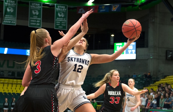 Scott Sommerdorf | The Salt Lake TribuneLauren Gustin drives for two of her 32 points. Salem Hills beat Hurricane 57-35 for the 4A girl's title, Saturday, March 3, 2018.