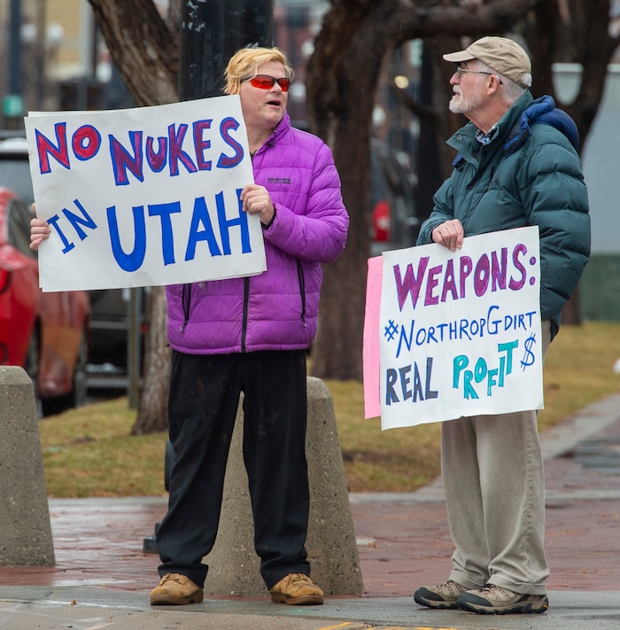 (Rick Egan  |  The Salt Lake Tribune) Marcus Collonge and Bob Brister take part in a picketing party against Northrop Grumman on 400 West and 100 South, near the Clark Planetarium in Salt Lake City, Sunday, Dec. 8, 2019.