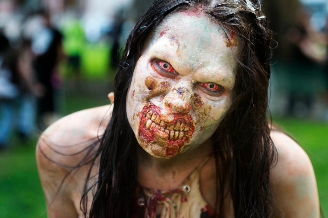    (Rick Egan  |  The Salt Lake Tribune)       McKayla dresses as a zombie as she walks the streets of Salt Lake during the 11th annual Salt Lake Zombie Walk, Sunday, Aug. 26, 2018.