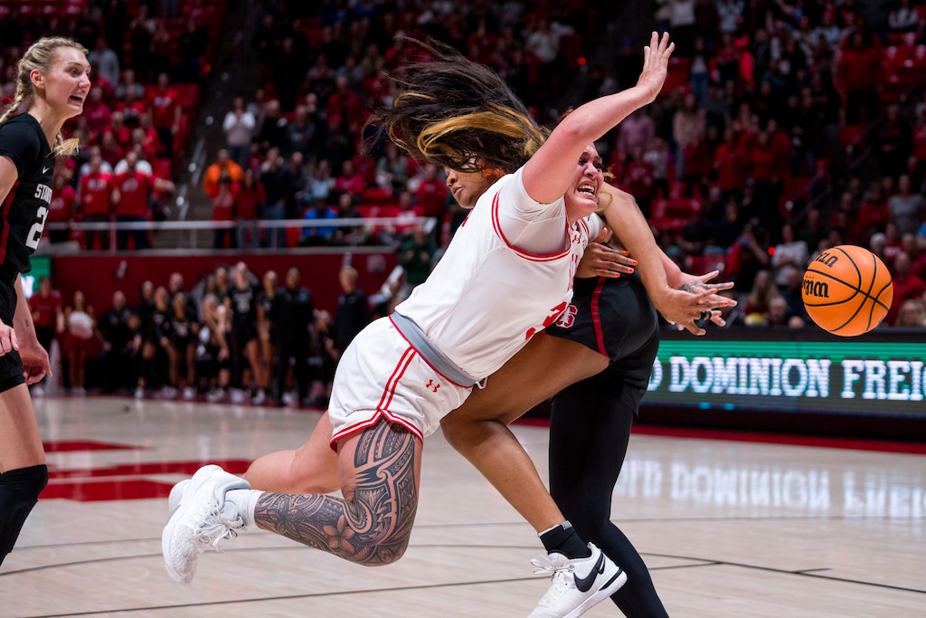 (Trent Nelson | The Salt Lake Tribune) Utah Utes forward Alissa Pili (35) is stopped by Stanford Cardinal forward Kiki Iriafen (44) with five seconds left in the game as Utah hosts Stanford, NCAA basketball in Salt Lake City on Friday, Jan. 12, 2024.