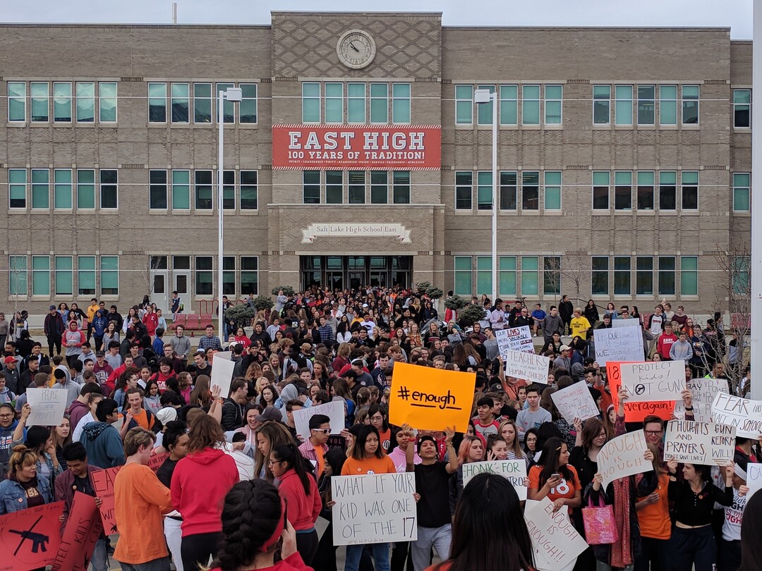 (Leah Hogsten  |  The Salt Lake Tribune) Students at east High School in Salt Lake City gather in front of the school to participate in a nationwide demonstration for better gun safety laws on March 14, 2018.