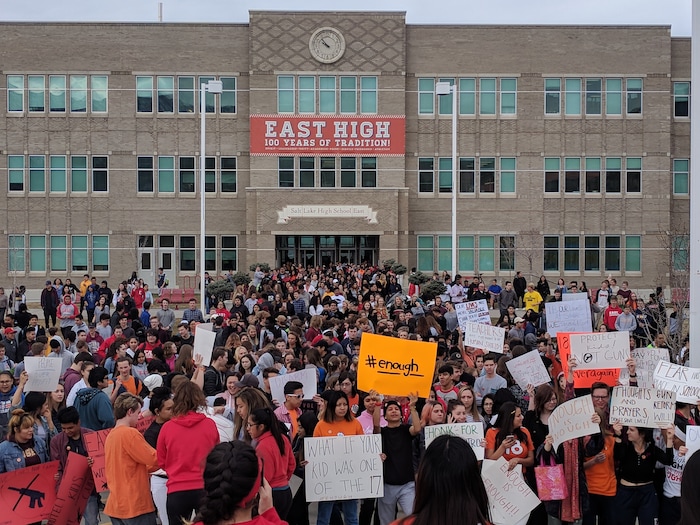 (Leah Hogsten  |  The Salt Lake Tribune) Students at east High School in Salt Lake City gather in front of the school to participate in a nationwide demonstration for better gun safety laws on March 14, 2018.