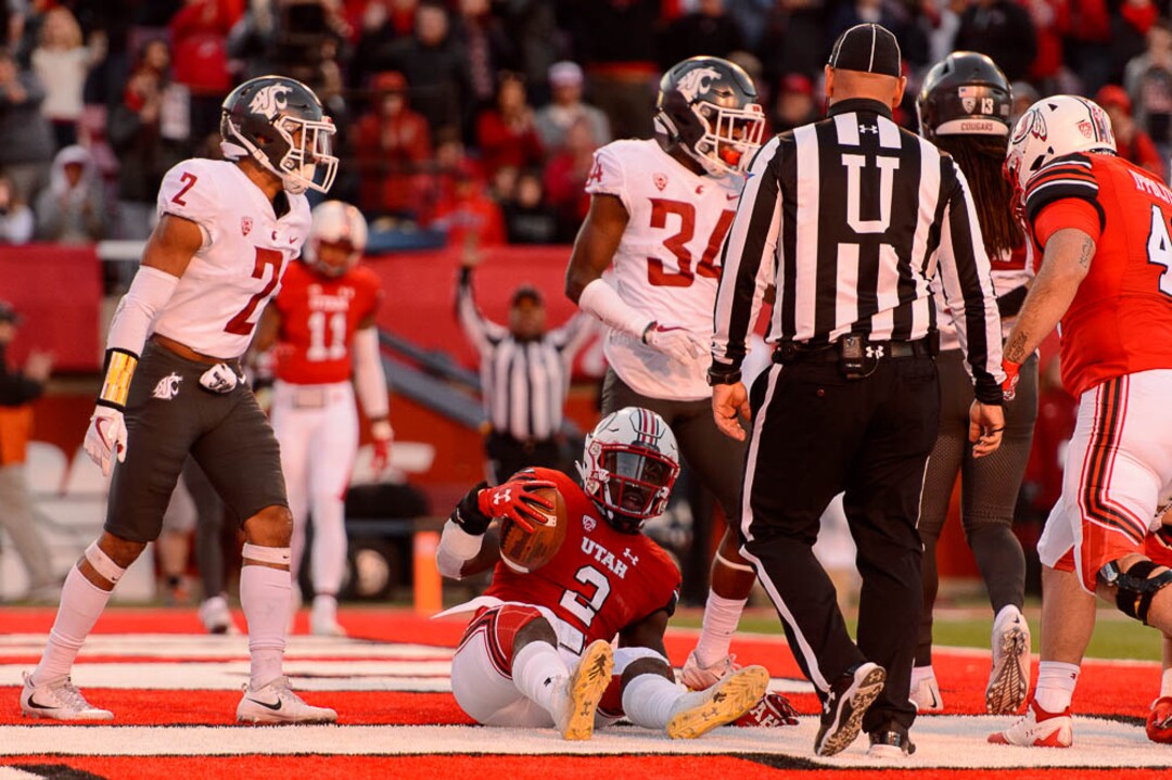 (Trent Nelson | The Salt Lake Tribune)  Utah Utes running back Zack Moss (2) scores a touchdown as the University of Utah hosts Washington State, NCAA football in Salt Lake City, Saturday November 11, 2017.