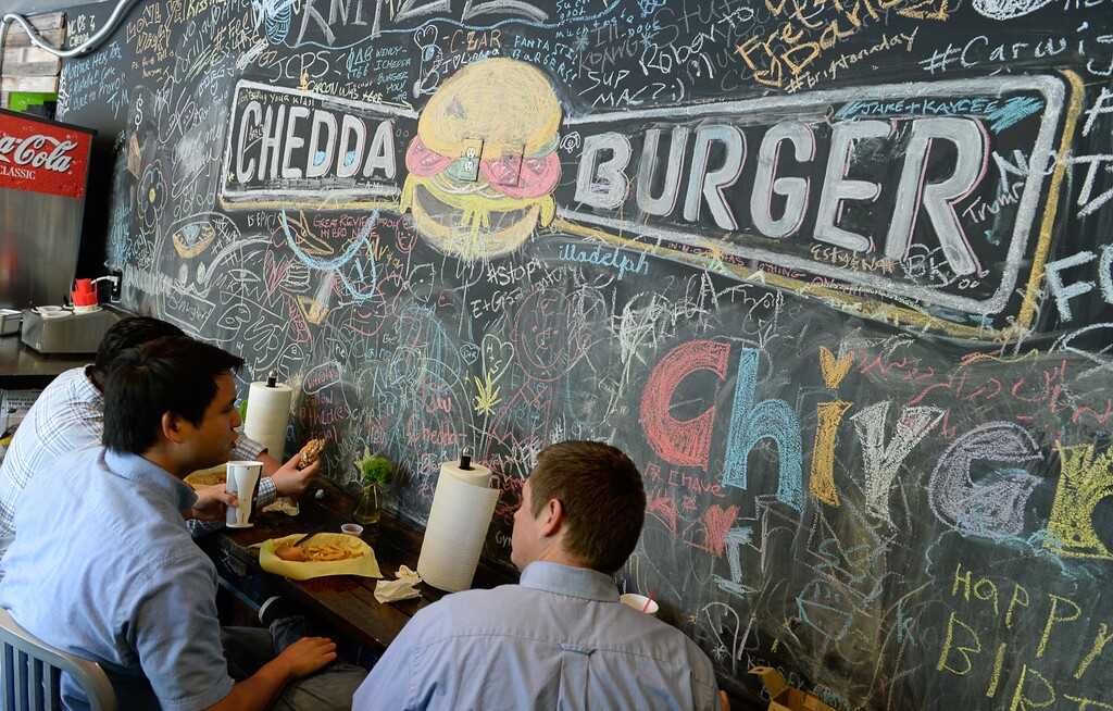 ( Francisco Kjolseth | The Salt Lake Tribune) Chedda Burger owner Nick Watts started his business as a food truck. He now has three locations, including a new spot at The Gateway.