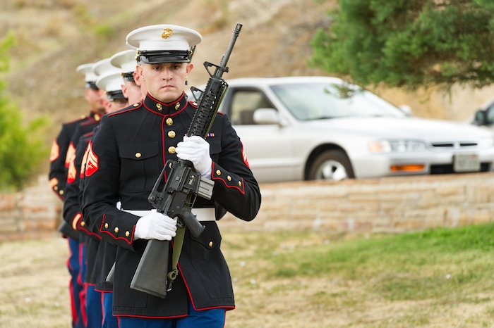 (Alex Gallivan  |  Special to The Tribune) Marine Pfc. Robert K. Holmes, who died 77 years ago aboard the USS Oklahoma during the attack on Pearl Harbor, is laid to rest in the Salt Lake City Cemetery, Monday, Aug. 20, 2018.