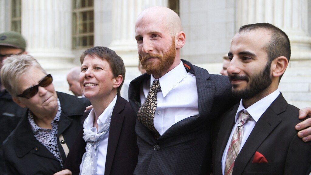 (Photo courtesy of Blue Fox Entertainment) The plaintiffs in Kitchen v. Herbert, the legal case that made same-sex marriage legal in Utah, gather outside the 10th Circuit Court of Appeals in Denver in 2014, in a scene from the documentary "Church & State." The plaintiffs are (from left): Laurie Wood, Kody Partridge, Derek Kitchen and Moudi Sbeity.