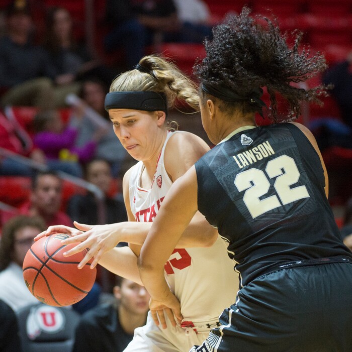 (Rick Egan  |  The Salt Lake Tribune)  Utah Utes forward Maurane Corbin (25)goes to inside with the ball, as Purdue Boilermakers forward Dani Lawson (22)defends, in basketball action Utah Utes vs. Purdue Boilermakers, at the Jon M. Huntsman Center, Monday, Nov. 20, 2017.