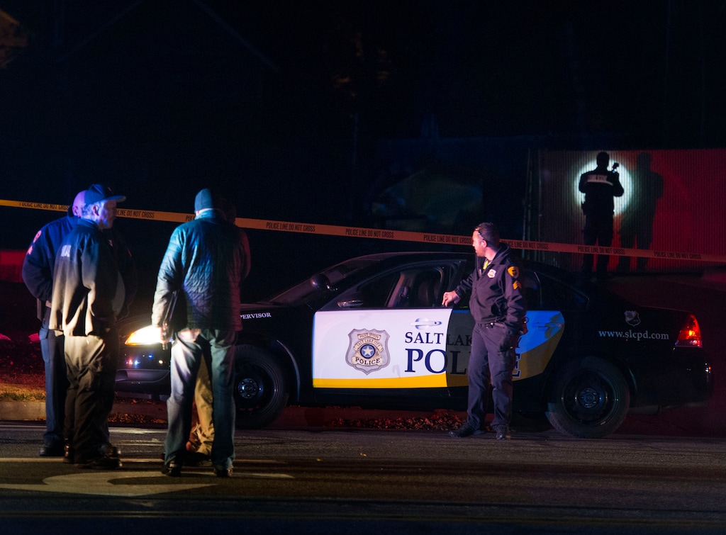 (Rick Egan  |  The Salt Lake Tribune)   Salt Lake City Police investigate a stabbing behind a dumpster on 500 North and 300 West, Wednesday, Nov. 7, 2018.