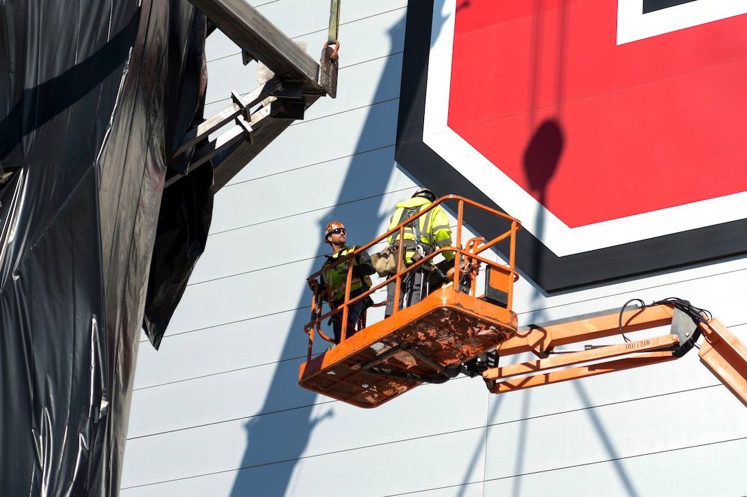 (Leah Hogsten  |  The Salt Lake Tribune)  Workers with Layton Construction and Mountain Crane began dismantling the 2002 Winter Olympic Cauldron located on the University of Utah's Rice-Eccles Stadium complex, Thursday, Feb. 13, 2020.  As part of the stadium's expansion project, the 19-year old cauldron will be restored to its former brilliance and re-installed on the grounds of Rice-Eccles Stadium, north of the ticket office, in 2021.