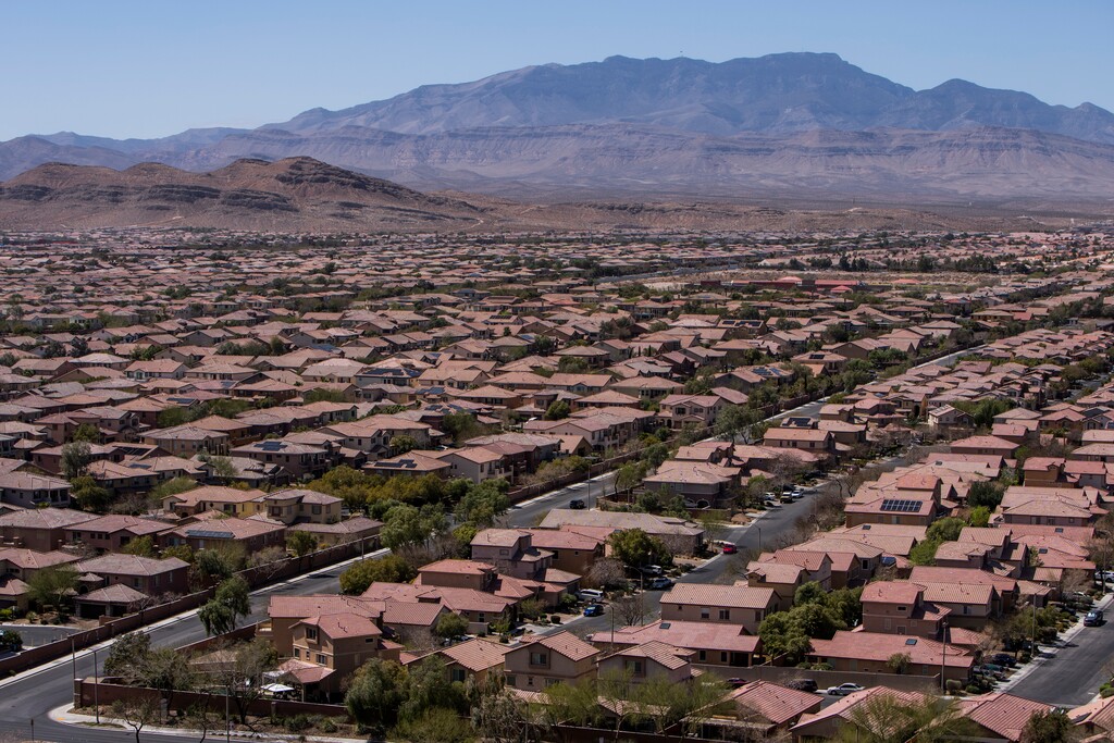 (Joe Buglewicz | The New York Times file) A residential area southwest of Las Vegas, March 28, 2022. Seven states that rely on the Colorado River for water were supposed to voluntarily cut back. Now, it appears the government will have to impose reductions.