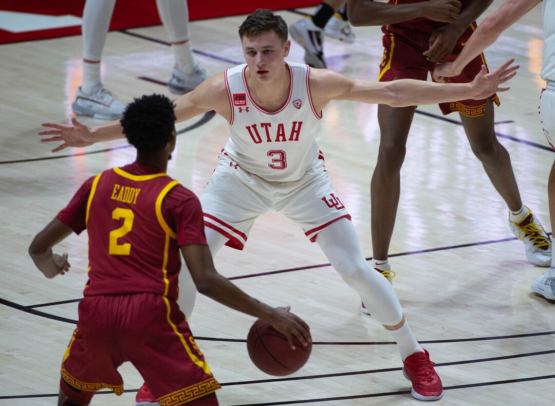 (Francisco Kjolseth  | The Salt Lake Tribune) Utah Utes guard Pelle Larsson (3) defends against USC Trojans guard Tahj Eaddy (2) in PAC-12 basketball action at the Jon M. Huntsman Center, on Saturday, Feb. 27, 2021.