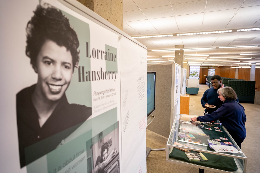 (Trent Nelson  |  The Salt Lake Tribune) Meligha Garfield, director of the Black Cultural Center at the University of Utah, and Joan Gregory look over an interactive exhibit highlighting six figures in African American history at the U.'s Eccles Health Sciences Library in Salt Lake City on Thursday, Feb. 20, 2020.