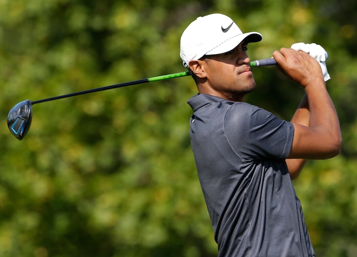 Tony Finau watches his tee shot on the fourth hole during the second round of the BMW Championship golf tournament at Conway Farms Golf Club, Friday, Sept. 15, 2017, in Lake Forest, Ill. (AP Photo/Nam Y. Huh)