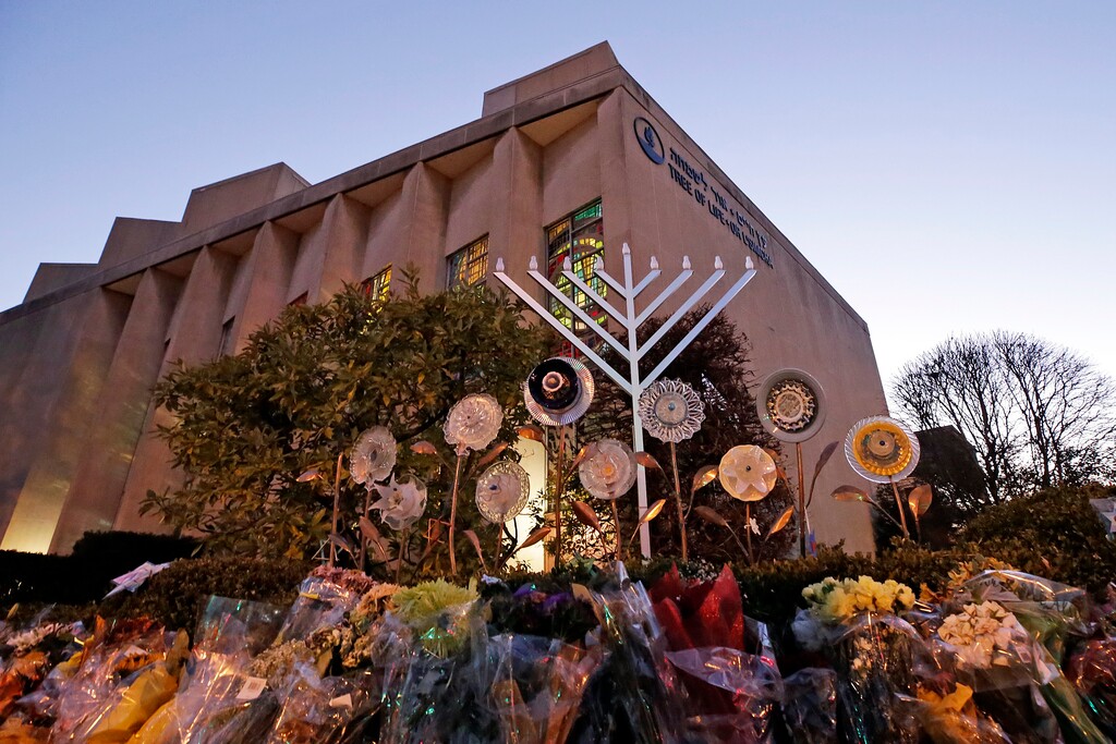 File - In this Sunday, Dec. 2, 2018 file photo, a menorah is installed outside the Tree of Life Synagogue in preparation for a celebration service at sundown on the first night of Hanukkah, in the Squirrel Hill neighborhood of Pittsburgh. A gunman shot and killed 11 people while they worshipped Saturday, Oct. 27, 2018 at the temple. Israeli researchers reported Wednesday that violent attacks against Jews spiked significantly last year, with the largest reported number of Jews killed in anti-Semitic acts in decades, leading to an "increasing sense of emergency" among Jewish communities worldwide. (AP Photo/Gene J. Puskar, File)
