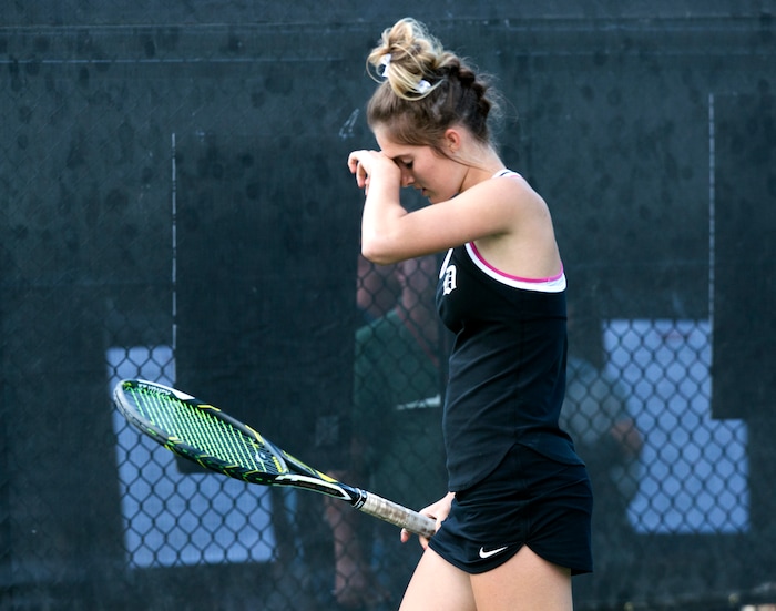 (Rick Egan  |  The Salt Lake Tribune) Mackenzie Turley, Davis High, reacts after missing a shot, as she plays Daniella Aaron, Lone Peak, in the 6A High School tennis championship game.  Turley defeated Aaron to place first in the #1 singles Friday, October 6, 2017.


