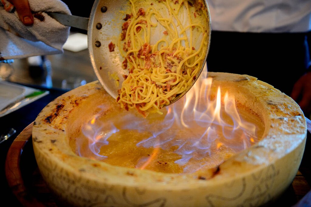 (Trent Nelson | The Salt Lake Tribune) A chef prepares Spaghetti alla Carbonara at Sicilia Mia, an Italian restaurant in Millcreek. Health experts consider the popular Utah dish a diet buster.