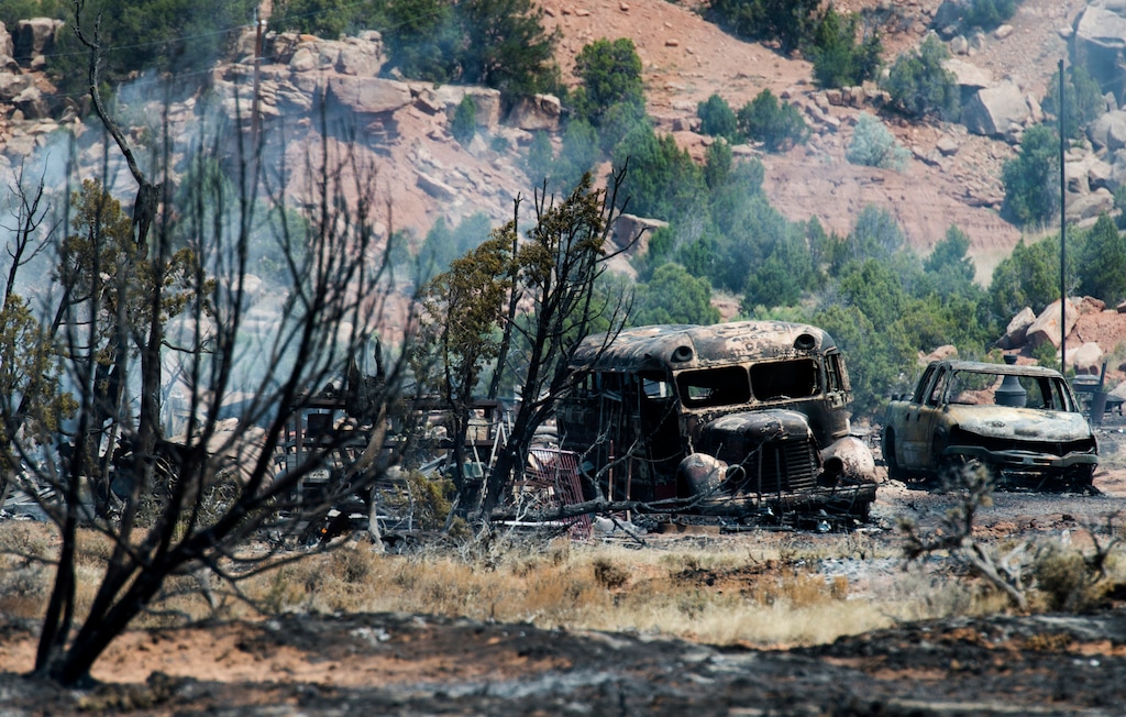 (Rick Egan  |  The Salt Lake Tribune)     A fire near Fruitland destroyed at least three structures, including at least one home, knocked out power to homes in the area and burned more than 20 acres in western Duchesne County.  Officials are still investigating the cause of the fire. Thursday, June 28, 2018.