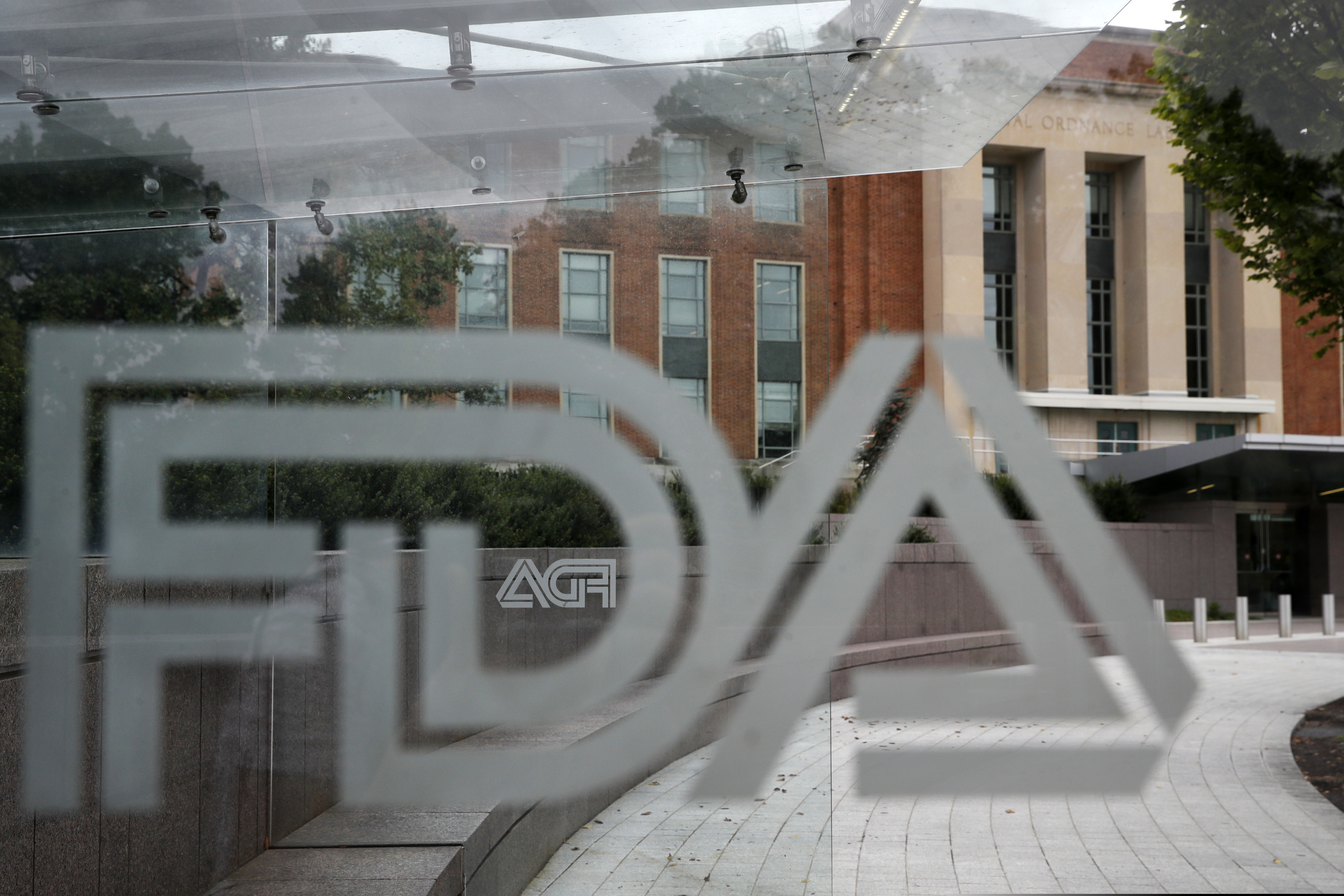 (Jacquelyn Martin | The Associated Press) This Aug. 2, 2018 file photo shows the U.S. Food and Drug Administration building behind FDA logos at a bus stop on the agency's campus in Silver Spring, Md. The FDA announced plans Monday, Feb. 11, 2019, to step up its policing of dietary supplements, which it said has mushroomed into a $40 billion industry with more than 50,000 products.