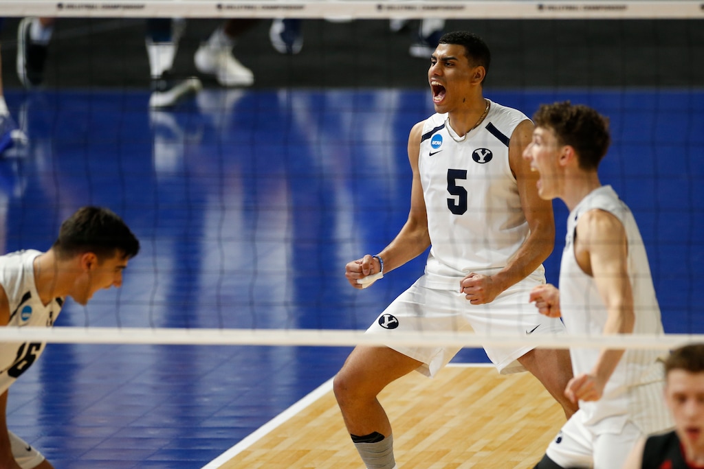 (Jay LaPrete | AP) BYU's Gabi Garcia Fernandez, center, celebrates after winning the first match against Lewis with teammates in the semifinals of the NCAA college men's volleyball tournament Thursday, May 6, 2021, in Columbus, Ohio.