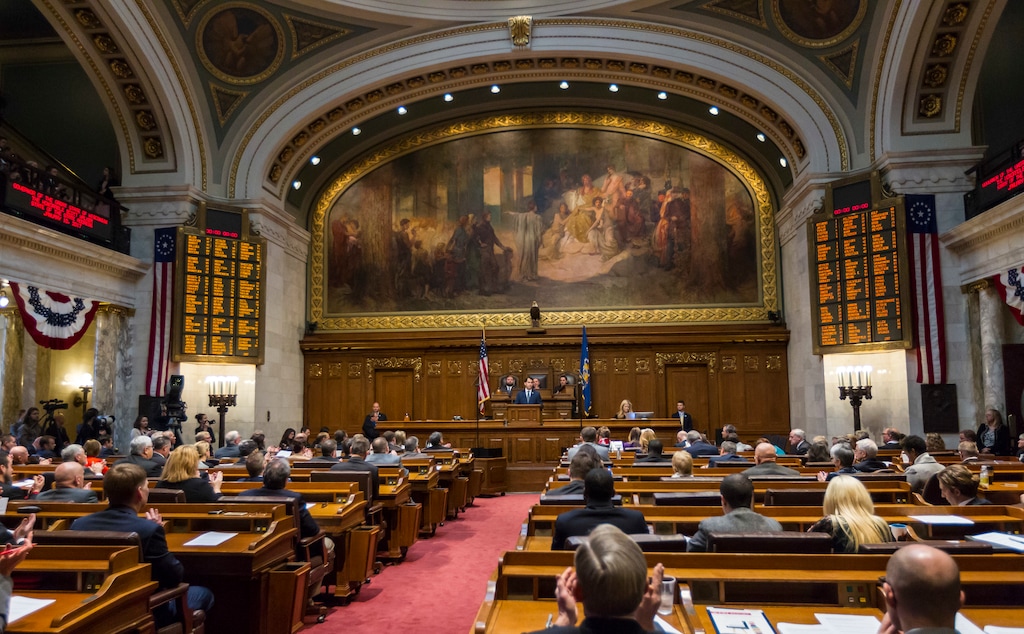 (Andy Manis | AP Photo) In this Jan. 10, 2017 file photo, Wisconsin Gov. Scott Walker addresses a joint session of the Legislature in the Assembly chambers at the state Capitol in Madison, Wis. Braced for a new era of divided government, lame-duck Republicans who have long controlled two upper Midwest states are priming last-ditch laws to advance their conservative agenda or to weaken the influence of Democratic governors-elect.The moves, which may spark lawsuits if they come to pass, would follow midterm elections in which Democrats swept statewide offices in Michigan and Wisconsin for the first time in decades but fell short of taking over gerrymandered legislatures.