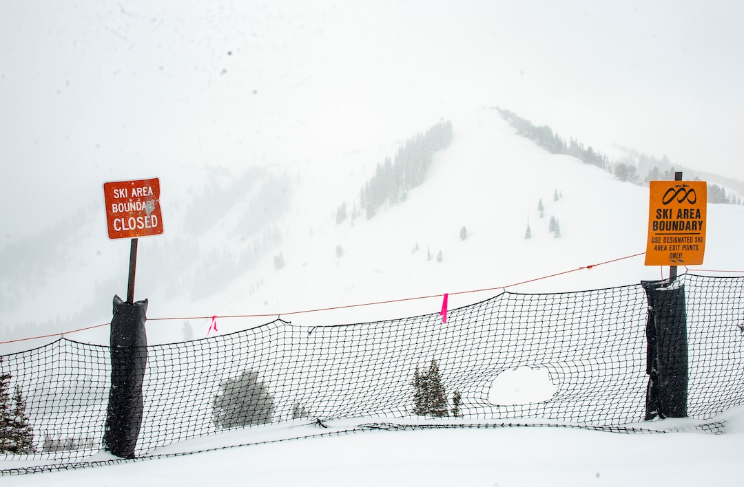 (Rick Egan | The Salt Lake Tribune)  The exit gate on the ridge above the Ninety-Nine 90 lift at Park City Mountain Resort has been closed since two men died in January in avalanches in the adjacent unmaintained backcountry areas after leaving the resort through that point.Wednesday, Feb. 24, 2021.