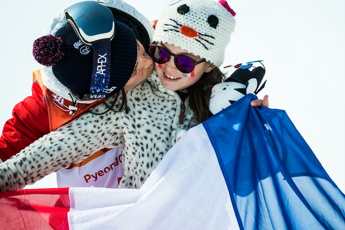 (Chris Detrick  |  The Salt Lake Tribune)  Marie Martinod of France kisses her daughter Meli Rose, 8, after the Ladies' Ski Halfpipe Final Run at Phoenix Park during the Pyeongchang 2018 Winter Olympics Tuesday, Feb. 20, 2018. 