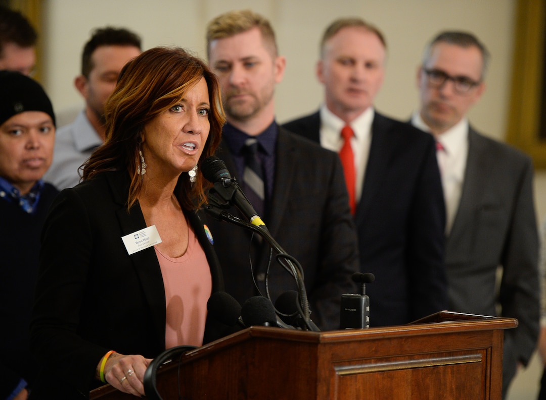 (Francisco Kjolseth  |  The Salt Lake Tribune)  Taryn Hiatt with the American Foundation for Suicide Prevention lends her voice during a press event at the Utah capitol as Craig Hall, R-West Valley, and Sen. Dan McCay, R-Riverton, introduce legislation to ban conversion therapy.