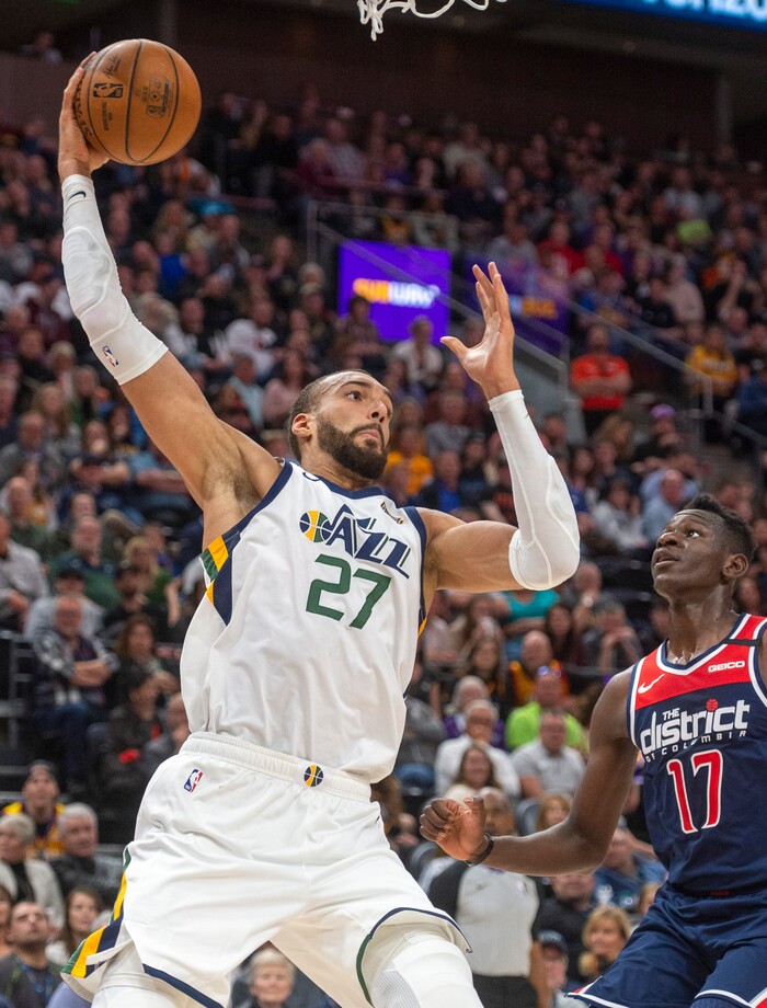 (Rick Egan  |  The Salt Lake Tribune)    Utah Jazz center Rudy Gobert (27) gets a pass in the low post as Washington Wizards forward Isaac Bonga (17) defends, in NBA action between the Utah Jazz and the Washington Wizards, in Salt Lake City, Friday, February 28, 2020